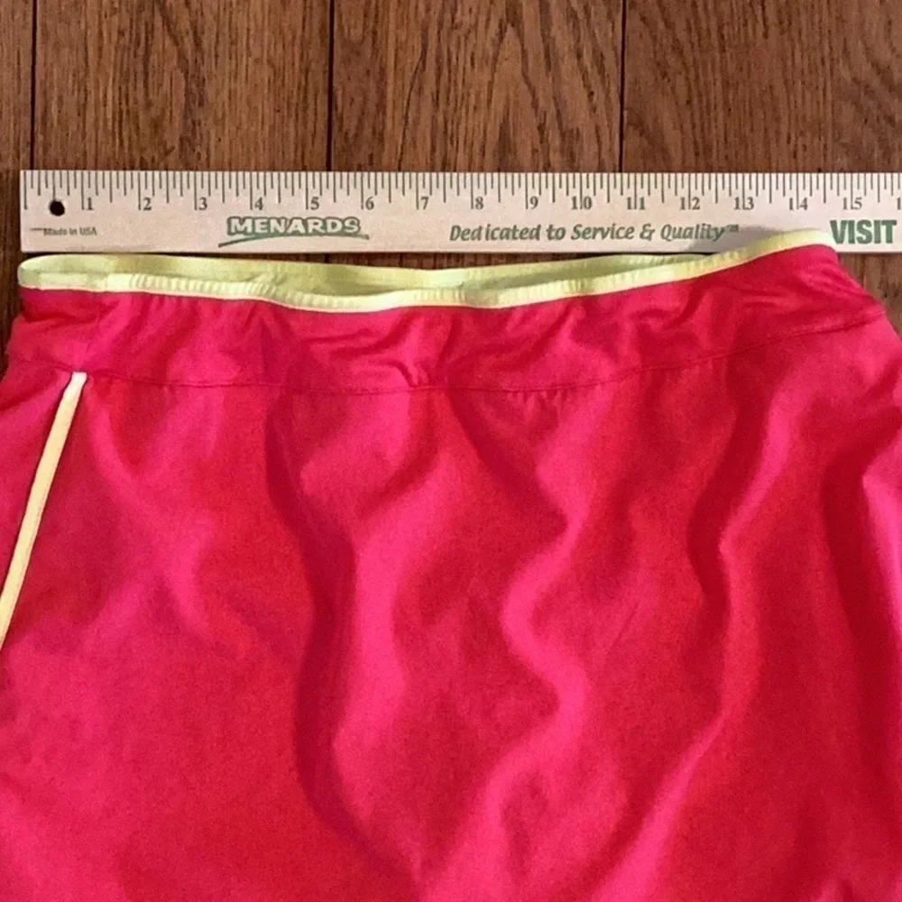 Izod cool-fx golf, tennis, hiking skort. Pink with yellow trim. Women’s size med